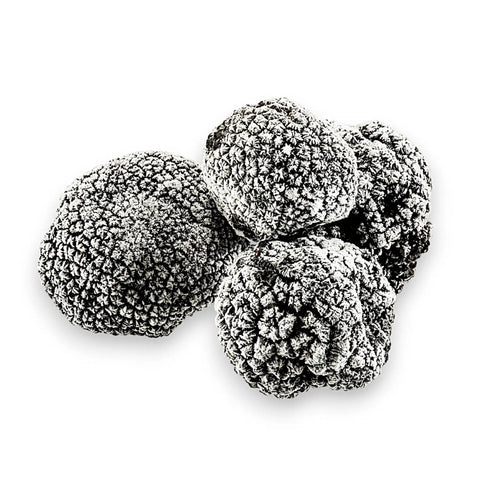 Black truffles with textured surface.