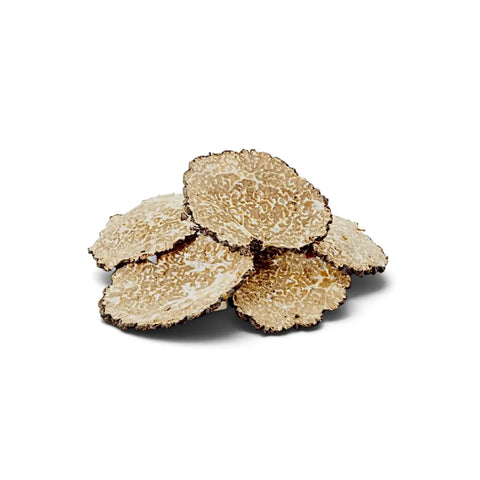 Dried truffle pieces, truffle powder, morels and porcini shown as different culinary formats
