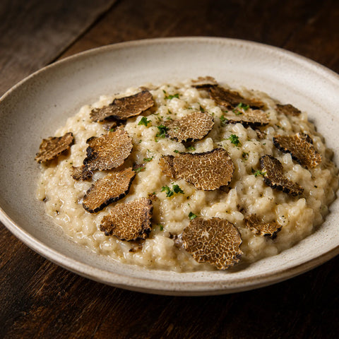 Rehydrated Tuber aestivum summer truffle slices incorporated into creamy risotto