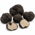 Trufas frescas enteras y cortadas Tuber aestivum Grado A con interiores color avellana pálido y un fino veteado