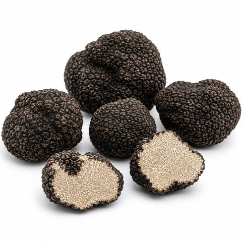 Trufas frescas enteras y cortadas Tuber aestivum Grado A con interiores color avellana pálido y un fino veteado