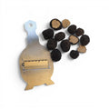 Trufas frescas Tuber aestivum de grado B que muestran ejemplares enteros pequeños e irregulares y un interior cortado de forma natural