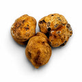 Trufas frescas Tuber borchii de grado A, con interior pálido y un fino veteado blanco natural