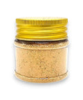 Jar of morchella esculenta morel powder with a gold lid for culinary use